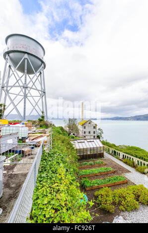 The Water Tower, gardens and Power House on Alcatraz Penitentiary island, now a museum, in San Francisco, California, USA. A vie Stock Photo