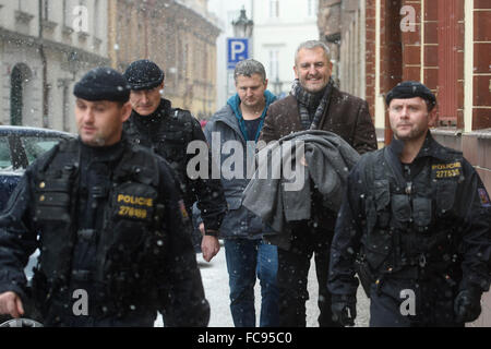 Czech businessman Petr Sisak, centre, and lawyer Ivo Hala, not on the photo, whom the police recently accused in absentia within a case of insolvency fraud, reported to the police today, on Wednesday, January 20, 2016, to give their explanation concerning the alleged manipulation of companies' insolvency, their defence lawyers told CTK. Sisak and Hala are among the 14 people accused within this case that also involves the harming of creditors and influencing of judges. Most of the suspects were arrested during the raid. © CTK/Alamy Live News Stock Photo