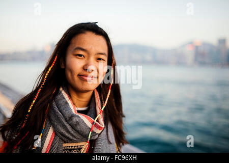 Portrait of young woman, Avenue of Stars, Tsim Sha Tsui Waterfront, Kowloon, Hong Kong, China, Asia Stock Photo