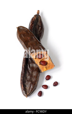 Ripe carob pods, carob powder can be used as a substitute for cocoa Stock Photo