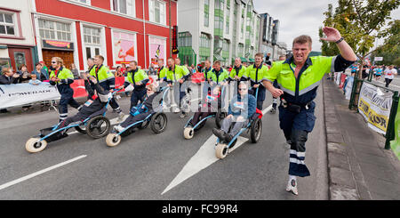 Runners and people using modified wheelchairs, Reykjavik Marathon, Reykjavik, Iceland Stock Photo