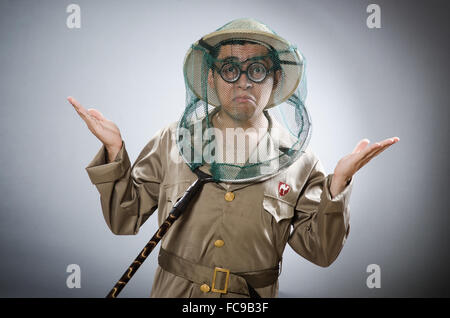 Funny safari traveller in travelling concept Stock Photo