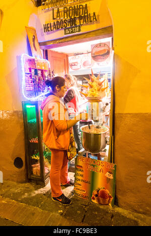 Calle La Ronda is a popular tourist destination in Quito, Ecuador. Numerous artisans,restaurants and gift stores line the street Stock Photo