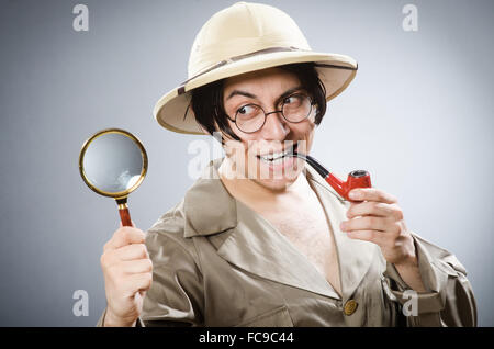 Funny safari traveller in travelling concept Stock Photo