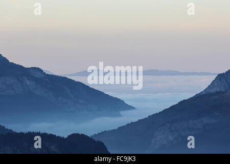 Misty clouds over lake Geneva Stock Photo