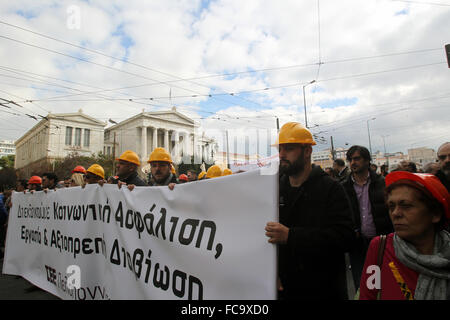 Athens, Greece. 21st Jan, 2016. A woman wearing yellow hat holding a ...