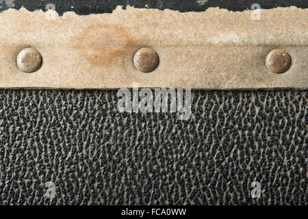 Rivets and leather parts from suitcase Stock Photo