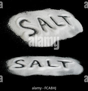 Salt Word Word Salt on black background Stock Photo - Alamy