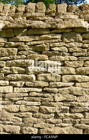 England, Oxfordshire, Great Tew, Cotswold dry stone wall. Stock Photo