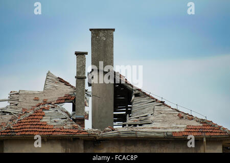 Old building with destroyed roof. Stock Photo