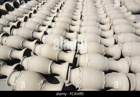 Clay pots drying in the sun, romanian pottery. Stock Photo