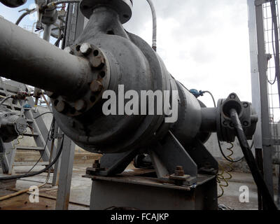 The pump for pumping of oil and  products. Oil refinery. Equipment for primary oil refining. Stock Photo