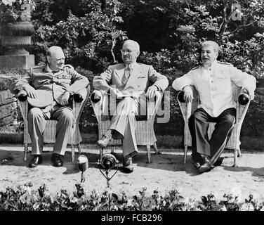 Potsdam Conference, 1945. British Prime Minister Winston Churchill, US President Harry S Truman, and Soviet Premier Joseph Stalin at the Potsdam Conference (sometimes known as the Berlin Conference) on July 25th 1945 Stock Photo