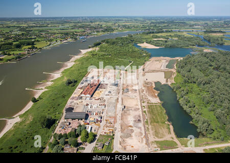 Netherlands, Kekerdom, Nature reserve Gelderse Poort. Area called Millinger Waard. Stone factory. Aerial Stock Photo