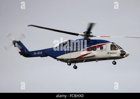 G-XCII, a Sikorsky S-92A operated by Bristow Helicopters, departs from Prestwick International Airport. Stock Photo