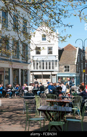 People enjoying the spring sunshine outside cafes in the Market Square in Margate Old Town, Kent. Stock Photo