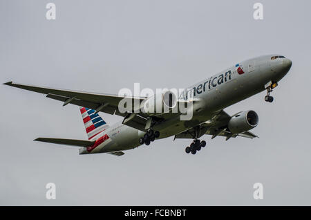 American Airlines Boeing 777-223(ER) - N786AN coming in to land at London Heathrow Airport in poor weather Stock Photo