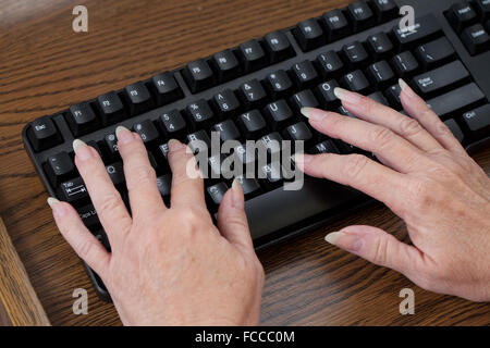 Typing on keyboard. Stock Photo