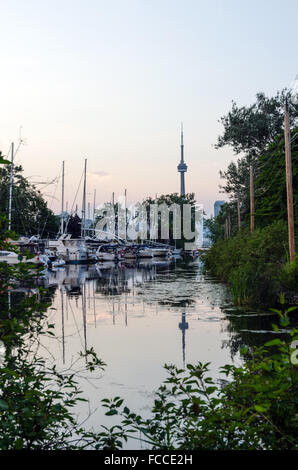 Skyline of Toronto over Ontario Lake at sunset Stock Photo