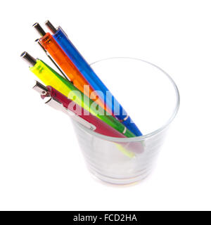 Multi-colored pens in a glass Stock Photo