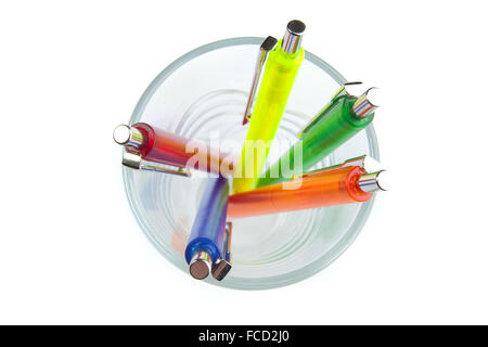 Multi-colored pens in a glass Stock Photo