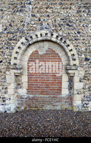 Norman north door, now bricked up. St Edmund's Church, South Burlingham, Norfolk Stock Photo