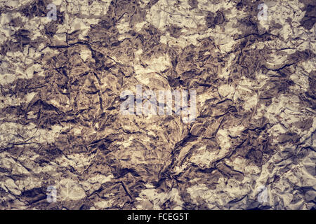 Brown abstract background, old crumpled paper, creative stylish wallpaper, grunge rustic texture, decorative element for wall Stock Photo