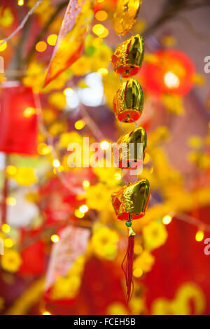 Chinese Lunar New Year or Tet decorations on the street, Vietnam. Stock Photo