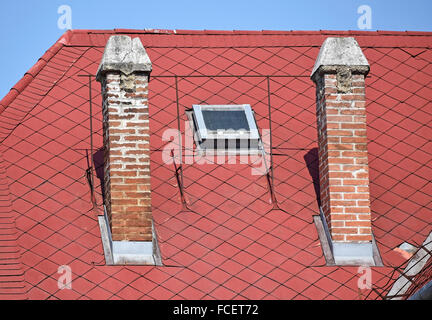 Smoke stacks on the roof Stock Photo