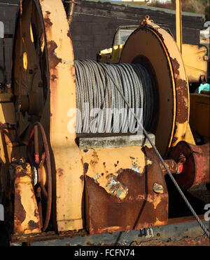Winches are now used to pull fishing boats out of the water and up the beach, Hastings Stock Photo