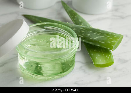 Aloe Vera gel in a glass jar for cosmetic use Stock Photo