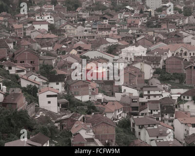 Aerial view of red house in Prizren, Kosovo, Europe at sunset. Stock Photo