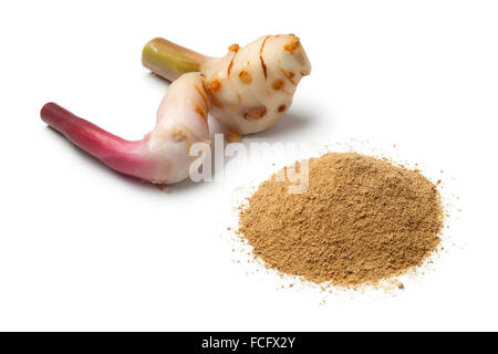 Fresh piece of Thai ginger and powder on white background Stock Photo