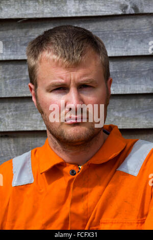 Portrait of a man wearing high visibility coveralls Stock Photo