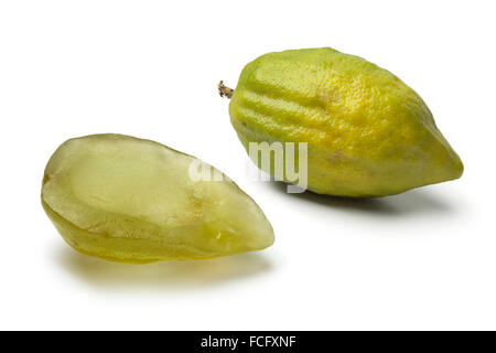 Fresh green Citrus medica and succade on white background Stock Photo