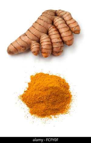 Fresh turmeric rhizome and a heap of ground turmeric powder on white background Stock Photo