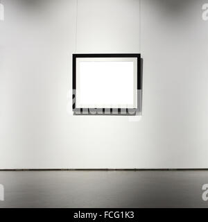 Exhibition hall with frame on the wall Stock Photo