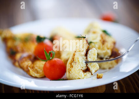 scrambled eggs with tomatoes Stock Photo