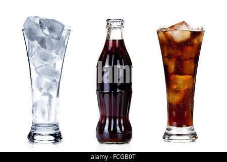 Bottle of cola with two glasses isolated on white background Stock Photo