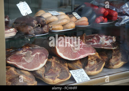 Pork products on display at a shop in the Portuguese city of Porto Stock Photo