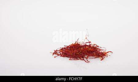 Handful of Spanish Saffron Isolated on white background Stock Photo