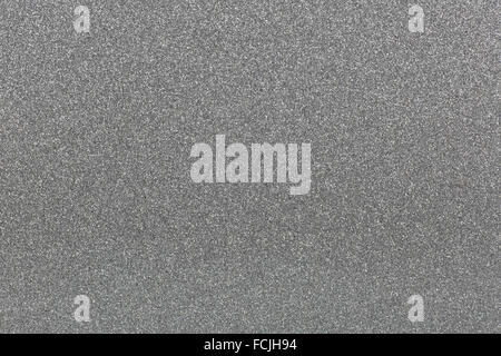 Shiny granular background texture in gray, easy to colorize. Stock Photo