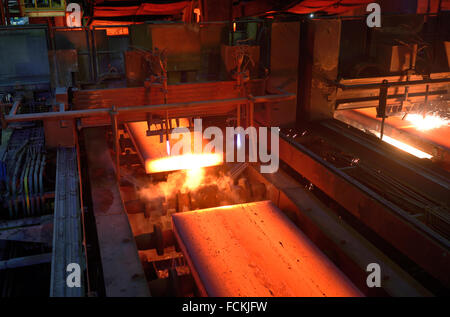 Gas cutting of the hot metal in a plant Stock Photo