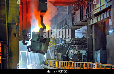 molten metal in ladle for casting Stock Photo