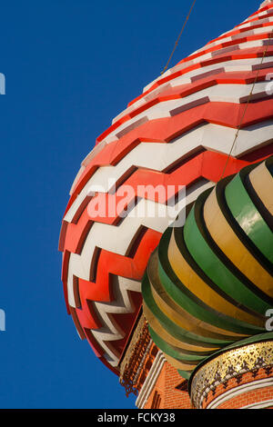 Detail of the striped onion domes of St Basil's Cathedral on Red Square, Moscow, Russia Stock Photo