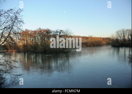 A cold and frosty late afternoon winters day at Coate Water Country Park Swindon Wiltshire Stock Photo