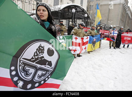 Kiev, Ukraine. 23rd Jan, 2016. Activicsts from different Ukrainian volunteer batalions, Chechen battalion behalf of Dzhokhar Dudayev, Georgian national legion and their supporters during a protest against the policies of Russian President Vladimir Putin in front the Russian Embassy in Kiev, Ukraine, 23 January, 2016. Credit:  Serg Glovny/ZUMA Wire/Alamy Live News Stock Photo