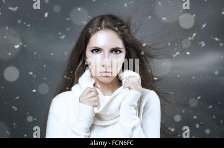 Winter Portrait of Woman in White Cashmere Sweater Stock Photo