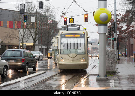 Seattle, USA. 23rd Jan, 2016. Streetcar pulling into the Broadway & Denny Station during the Settle Streetcar First Hill Line inaugural run on January 23, 2016. The First Hill Streetcar is a 4 kilometer-long line that connects Pioneer Square and Capitol Hill via the International District, Yesler Terrace, and First Hill. It is the second line implemented after the South Lake Union Streetcar opened in 2007. Credit:  Paul Gordon/Alamy Live News Stock Photo