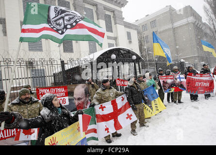Kiev, Ukraine. 23rd Jan, 2016. Activists from Ukrainian voluntary battalions 'Georgia national legion' Chechen battalion named of Dzhokhar Dudayev, and their supporters during protest against the politics of Russian President Vladimir Putin, in front the Russian Embassy. © Vasyl Shevchenko/Pacific Press/Alamy Live News Stock Photo